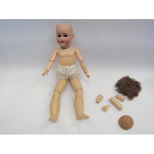 5133 - A Kley & Hahn bisque head doll with open mouth showing four teeth, composition body with jointed lim... 