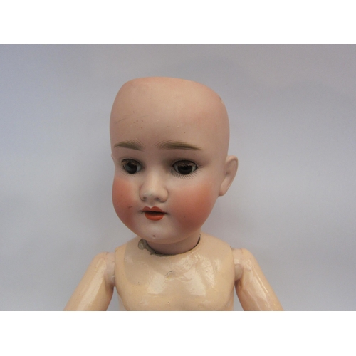 5133 - A Kley & Hahn bisque head doll with open mouth showing four teeth, composition body with jointed lim... 