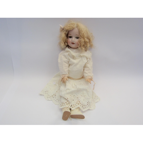 5135 - An Armand Marseille bisque head doll with brown sleepy eyes, open mouth showing four teeth, blonde w... 