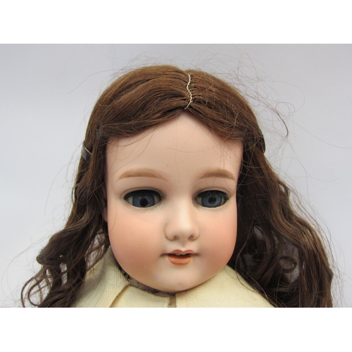 5137 - An Armand Marseille bisque head doll with blue sleepy eyes, open mouth showing four teeth, brown wig... 