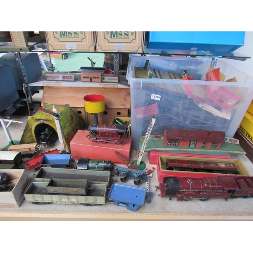 5288 - A large collection of playworn 0 gauge locomotives, rolling stock, track and accessories including M... 