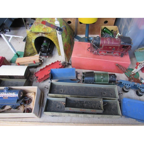 5288 - A large collection of playworn 0 gauge locomotives, rolling stock, track and accessories including M... 