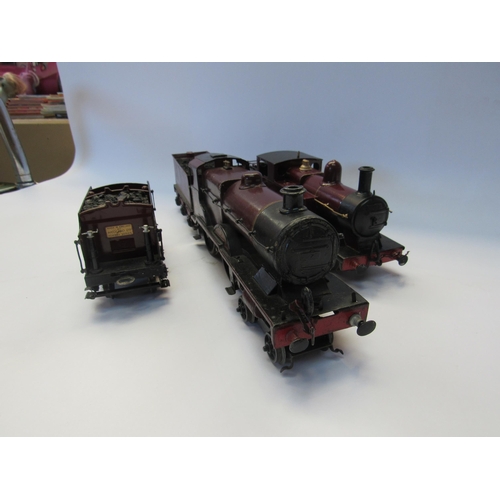 5323 - A Hornby 0 gauge 4-4-0 locomotive and accompanying six wheel tender in L.M.S livery and another 0 ga... 