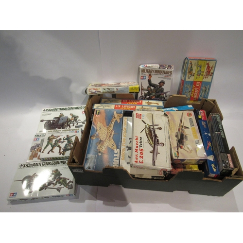 5204 - A box of assorted plastic model kits and figures including Tamiya, Airfix, Heller etc, unchecked