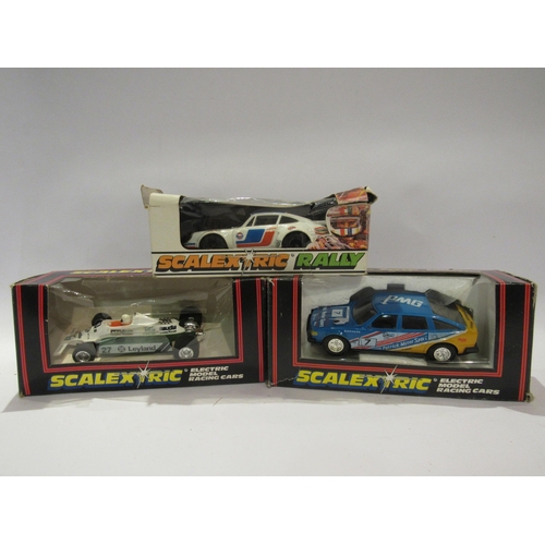 5222 - Three boxed Scalextric slot racing cars to include C115 Porsche Turbo 935, C280 PMG Rover and C138 S... 