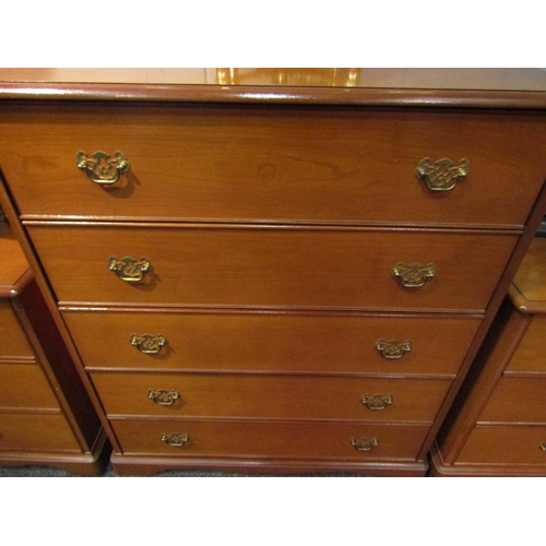 1038 - A five drawer chest of drawers with brass handles, 99cm high x 85cm wide x 43cm deep