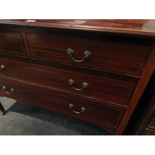 1067 - An Edwardian mahogany dressing table, two short over two long drawers, 152cm high x 107cm wide x 49c... 