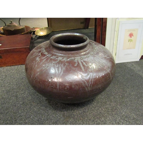 1136 - A glazed terracotta squat vase, chip to rim, 43cm diameter