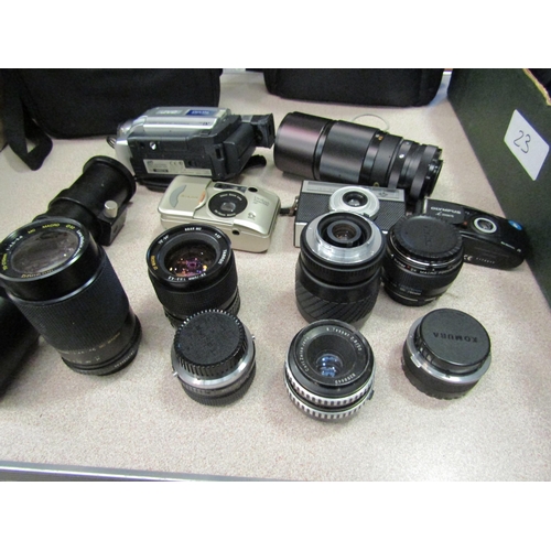 1182 - A good quantity of assorted cameras and accessories including case containing Olympus OM30 camera wi... 