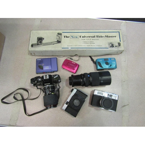 1182 - A good quantity of assorted cameras and accessories including case containing Olympus OM30 camera wi... 