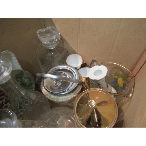 1242 - A box of assorted glass decanters, gilt coffee set, pair of vases, etc