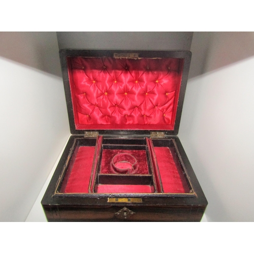 1419 - A Victorian coromandel jewellery box with fitted interior, handle to top