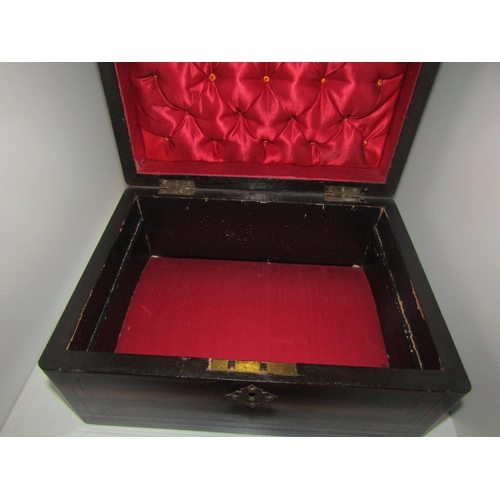 1419 - A Victorian coromandel jewellery box with fitted interior, handle to top