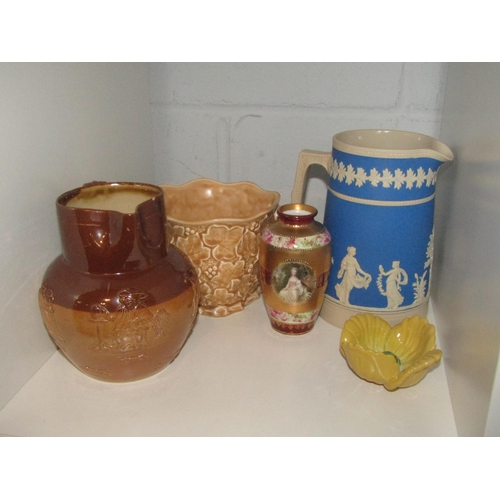 1426 - A selection of ceramics including Doulton Lambeth harvest jug, Royal Doulton planters and bud vase. ... 