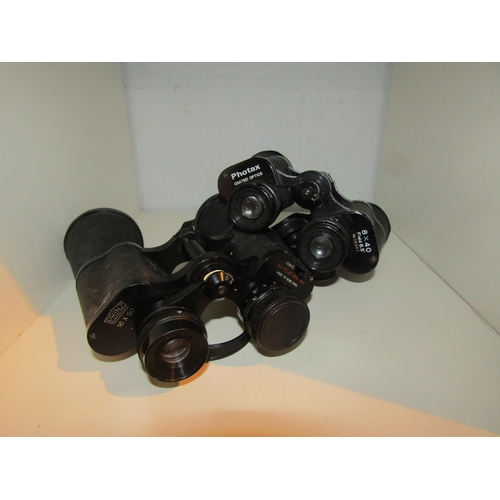 1443 - Two pairs of cased binoculars, Prinz 16 X 50 (a/f) and Photax 8 X 40     (E)  £15-25