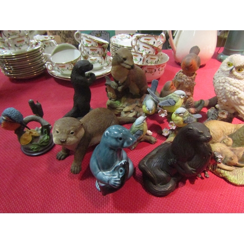 1478 - A selection of bird and otter figues including ceramics     (E)  £10-15