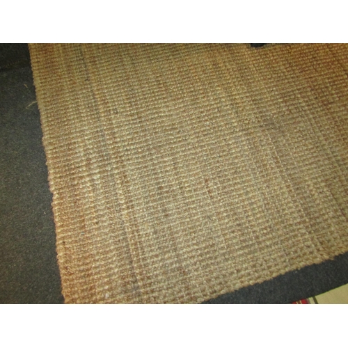 1111 - A natural jute rug, 250cm x 180cm and a Pottery Barn striped cotton runner rug, 177cm x 40cm