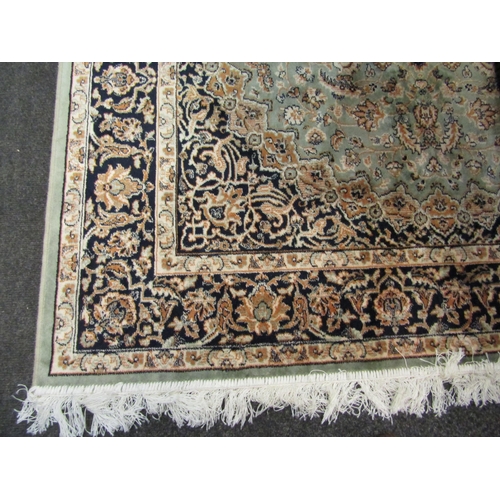 1150 - A silk rug with multiple borders and central cartouche, 184cm x 133cm