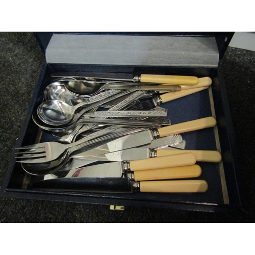 1466 - A box of plated flatware, vases, ornaments, etc