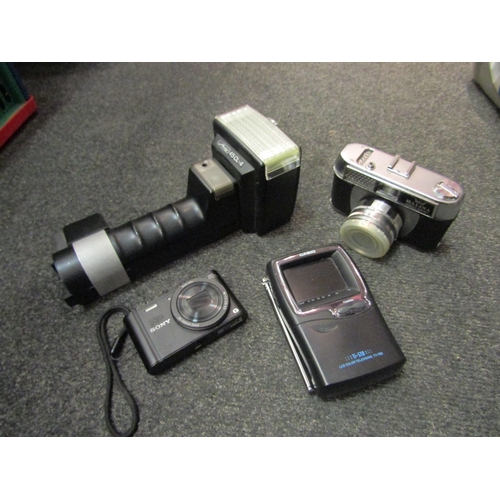 1524 - Three boxes containing a good quantity of assorted cameras and camera accessories including Pentax, ... 