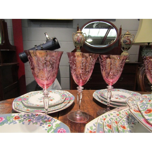 1077 - A set of six 'Hookes' wine glasses with cranberry bowls