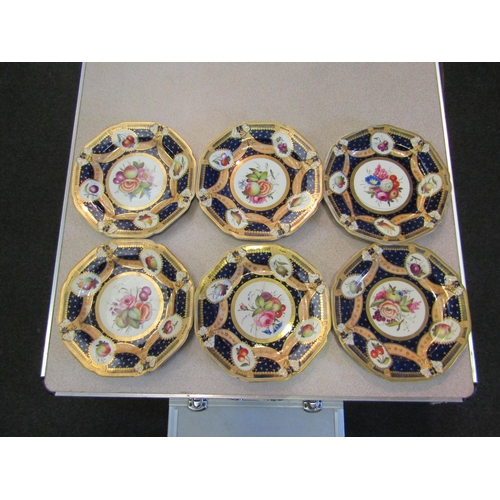 1291 - A set of fifteen early 19th Century hand decorated and gilded plates, some a/f