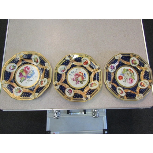 1291 - A set of fifteen early 19th Century hand decorated and gilded plates, some a/f