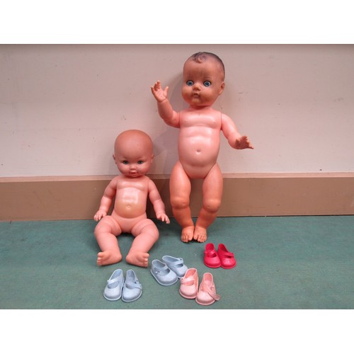 5137A - Two mid 20th Century plastic dolls including Jasmar, together with four pairs of shoes