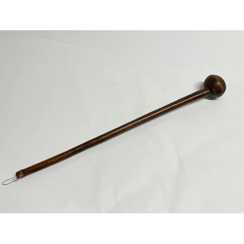 4018 - A Zulu knobkerrie, notches to shaft, split, 68cm long