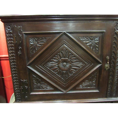 4062 - Possibly Welsh a 17th Century revival housekeepers cupboard with carved lozenge/acanthus leaf and tu... 