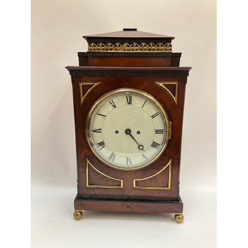 4076 - A Regency mahogany and brass mounted bracket clock, twin fusee striking movement with a rack and sna... 