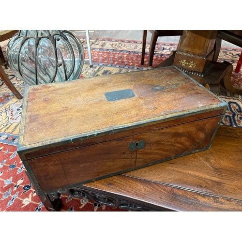 4129 - A 19th Century military campaign writing box with brass mounts and fitted interior, the lid inscribe... 