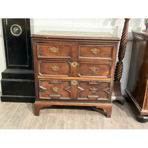 4143 - A 17th Century oak chest of two over two drawers with geometric moulding, later bracket feet, 92cm h... 