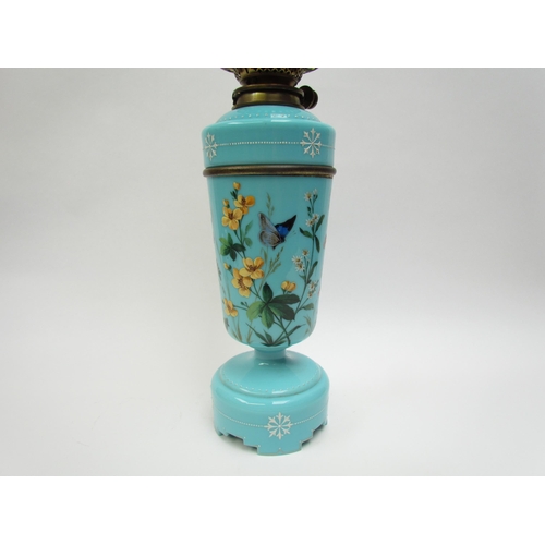 4187 - A Victorian painted turquoise glass oil lamp decorated with bird and butterfly, with vaseline glass ... 