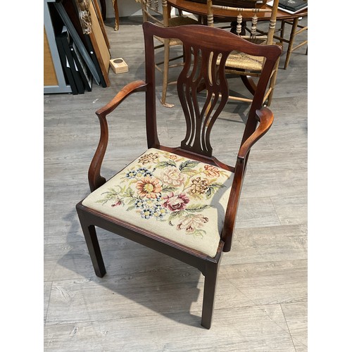 4248 - A Georgian mahogany Chippendale design armchair with pierced central splat over a floral needlepoint... 