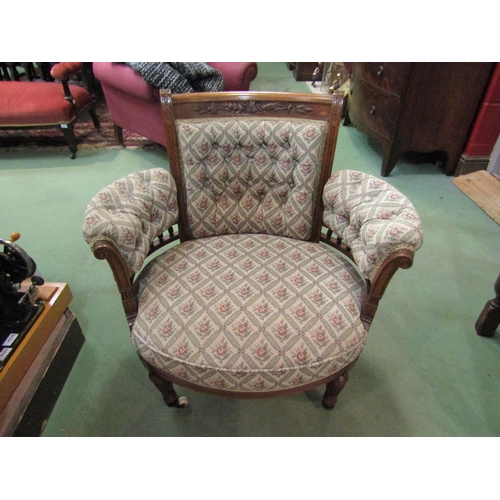 4252 - In the manner of Gillows of Lancaster a circa 1890 carved mahogany open armchair the button back res... 