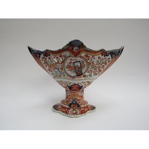 4300 - A 19th Century Japanese Imari deep boat-shaped pedestal bowl, lavishly decorated inside and out, 20.... 