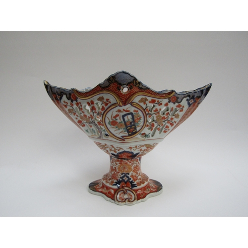 4300 - A 19th Century Japanese Imari deep boat-shaped pedestal bowl, lavishly decorated inside and out, 20.... 