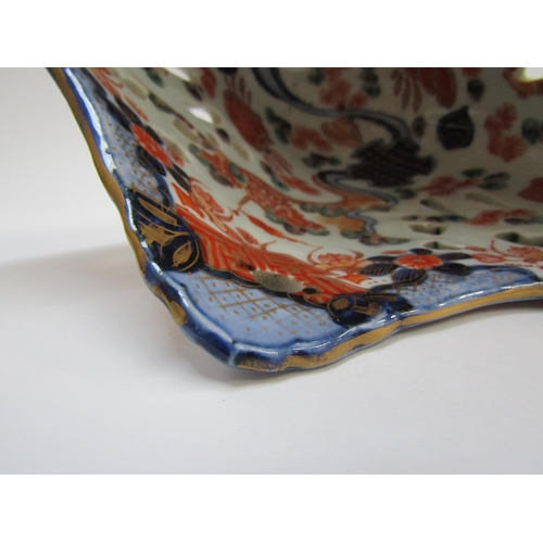 4300 - A 19th Century Japanese Imari deep boat-shaped pedestal bowl, lavishly decorated inside and out, 20.... 