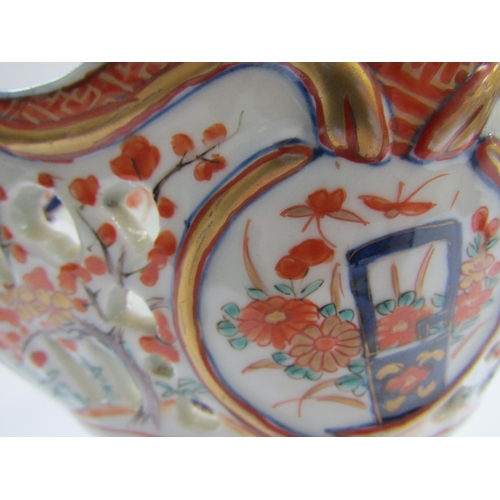 4300 - A 19th Century Japanese Imari deep boat-shaped pedestal bowl, lavishly decorated inside and out, 20.... 