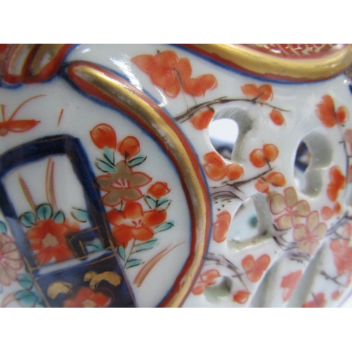 4300 - A 19th Century Japanese Imari deep boat-shaped pedestal bowl, lavishly decorated inside and out, 20.... 