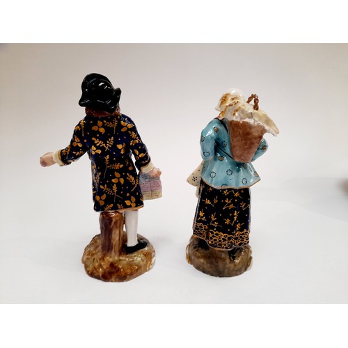 4307 - A pair of early 19th Century Derby porcelain figures, a lady with a basket and a gentleman ticket se... 