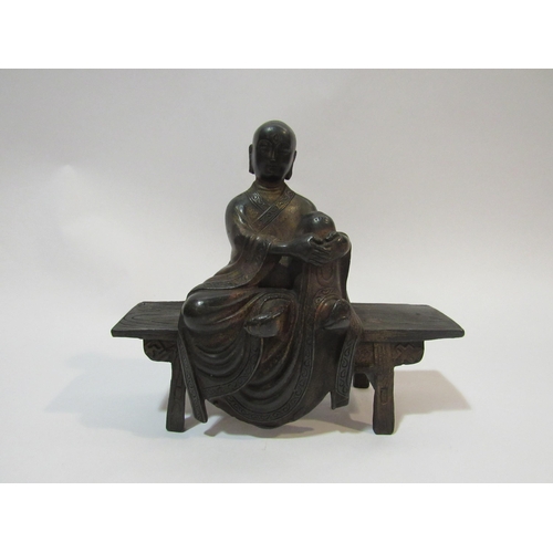 4330 - A Tibetan seated Buddha, 20cm wide x 20cm high   (R)  £70