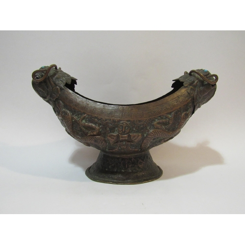 4334 - An 18th Century style Tibetan Repousse copper ceremonial vessel with inlaid turquoise eyes, similar ... 