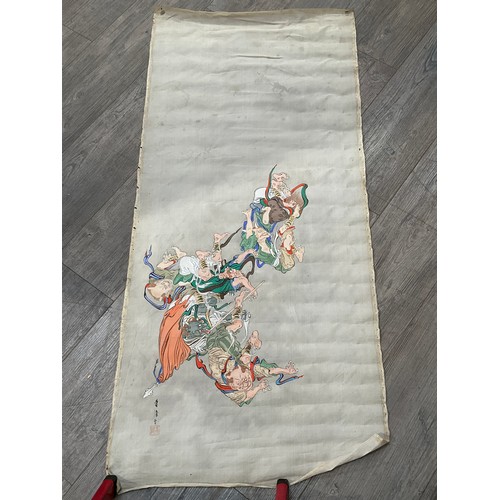 4122 - An Oriental handpainted silk display of a battle scene, unframed, 132cm x 59cm    (R)  £50