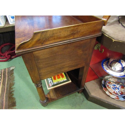 4006 - A William IV mahogany dressing table with three quarter gallery back, five drawers with melon fluted... 