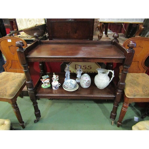 4024 - A circa 1840 mahogany two tier buffet/serving table the three quarter raised shelves and turned supp... 