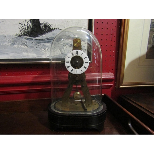 4068 - A 19th Century French skeleton clock of small proportions, by Holt, Paris, with glass dome, 26cm hig... 