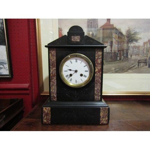 4072 - A 19th Century slate mantel clock, flanked by marble inserts, Roman numeral dial, pediment top, with... 