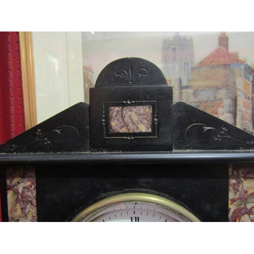 4072 - A 19th Century slate mantel clock, flanked by marble inserts, Roman numeral dial, pediment top, with... 